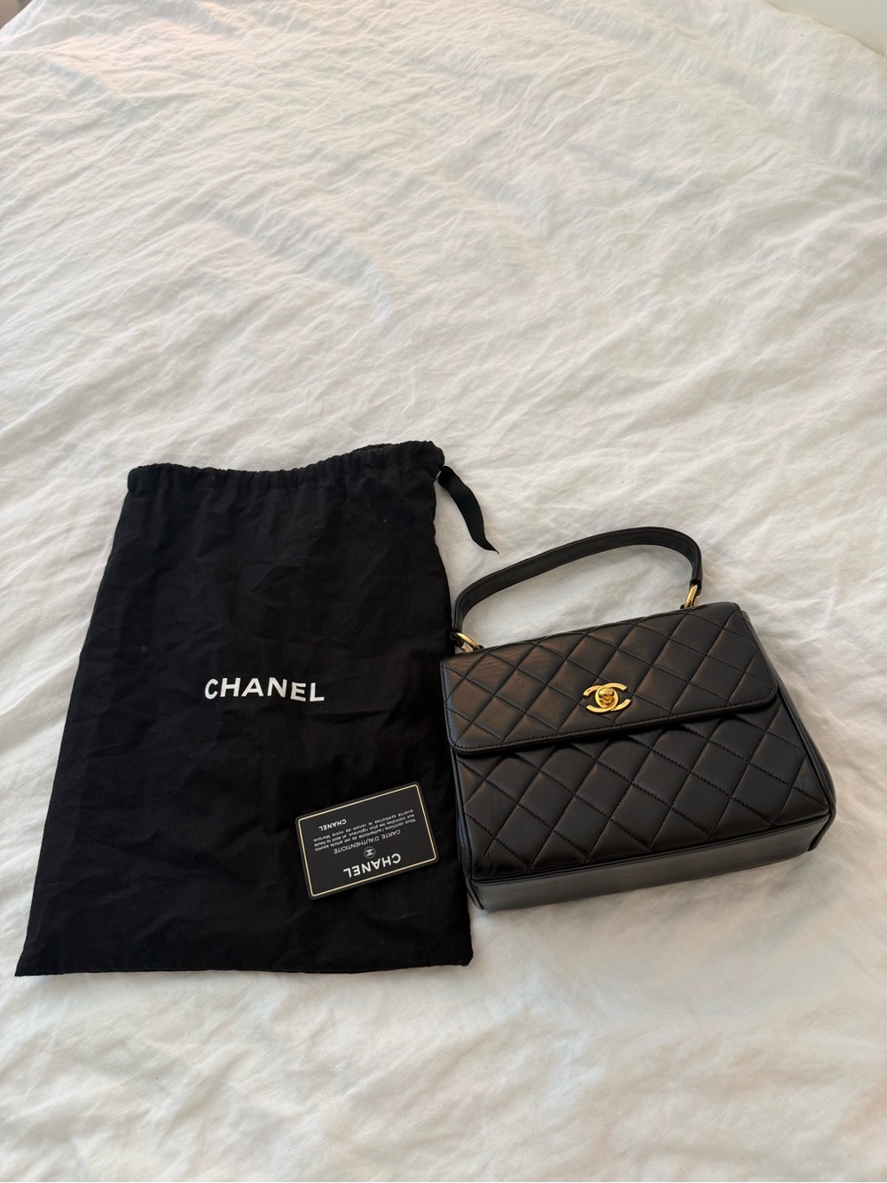 Chanel Vintage Small Kelly Top Handle Bag - Black Quilted Lambskin Year 96-97